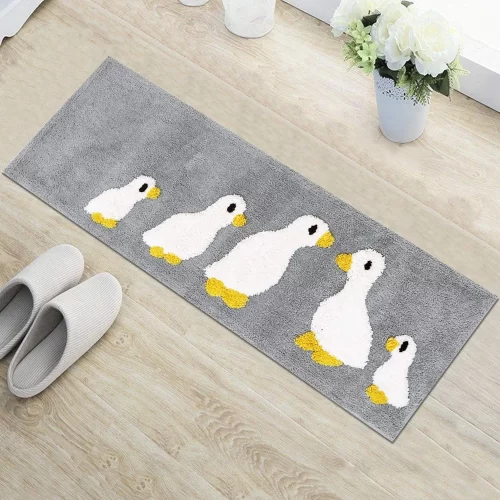 ALLURING PATTERN RUG RUNNER- A raised duck motif provides a pop of pattern and a touch of texture, while a two-toned color palette creates crisp contrast. Instantly upgrade your bedroom, hallway, kitchen, bathroom or any room ensemble with this Floor Rug Runner. Lend a touch of texture to your house with this enticing patterned soft rug. SIZE - This Floor Runner Mat measures 40x120 cm. SOFT RUG MAT - HOKIPO Rug Runner is made from soft and high density microfiber, giving your feet the gift of exceptional comfort and softness. Everytime you step on this soft rug you enjoy superior comfort. SUPER ABSORBENT FLOOR RUNNER - This Microfiber Runner Rug Mat absorbs water and dries quickly; for supreme comfort from one use to the next. ANTISLIP FLOOR MATS - The Skid-resistant bottom of this Floor Runner Mat is made of high quality EVA FOAM BACKING (not PVC or Glue). Anti-skid backing of this Mat Runner helps keep the mat firmly in place, so that it won't slip or slide to keep you more safe and cozy. Place the rug on a dry smooth floor only. VERSATILE RUNNER RUG - Soft, Cozy, embossed style allows for endless decorating options. You may use it as Runner For Bedroom, Kitchen Runner for Floor, Hallway Runner Rug, Bedside Runner Carpet, Soft Rug for Living Room, Hall Runner Rug for Floor, Balcony Mat, Bathroom Runner Rug Mat, Kitchen Rug, Rugs for Sofa, Chair etc. MACHINE WASHABLE RUNNER MAT - We use the more expensive EVA FOAM backing (not PVC or glue) in our Floor Rug Runner which is much stronger and durable for long lasting use. Simply toss it into the washing machine, wash cold, hang to dry or air-dry flat. PACKAGE CONTENTS - 1 Floor Runner Rug Mat.